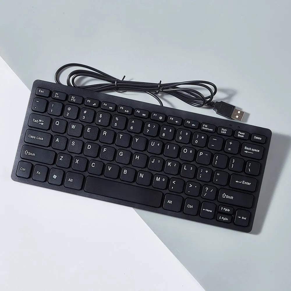 USB wired mini keyboard in black with compact 280mm width and noiseless keys for laptop use