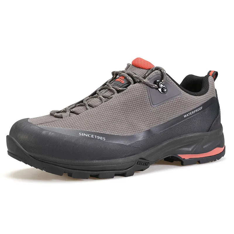 Men's low-top mountain climbing hiking boots with rubber outsole and lace-up front