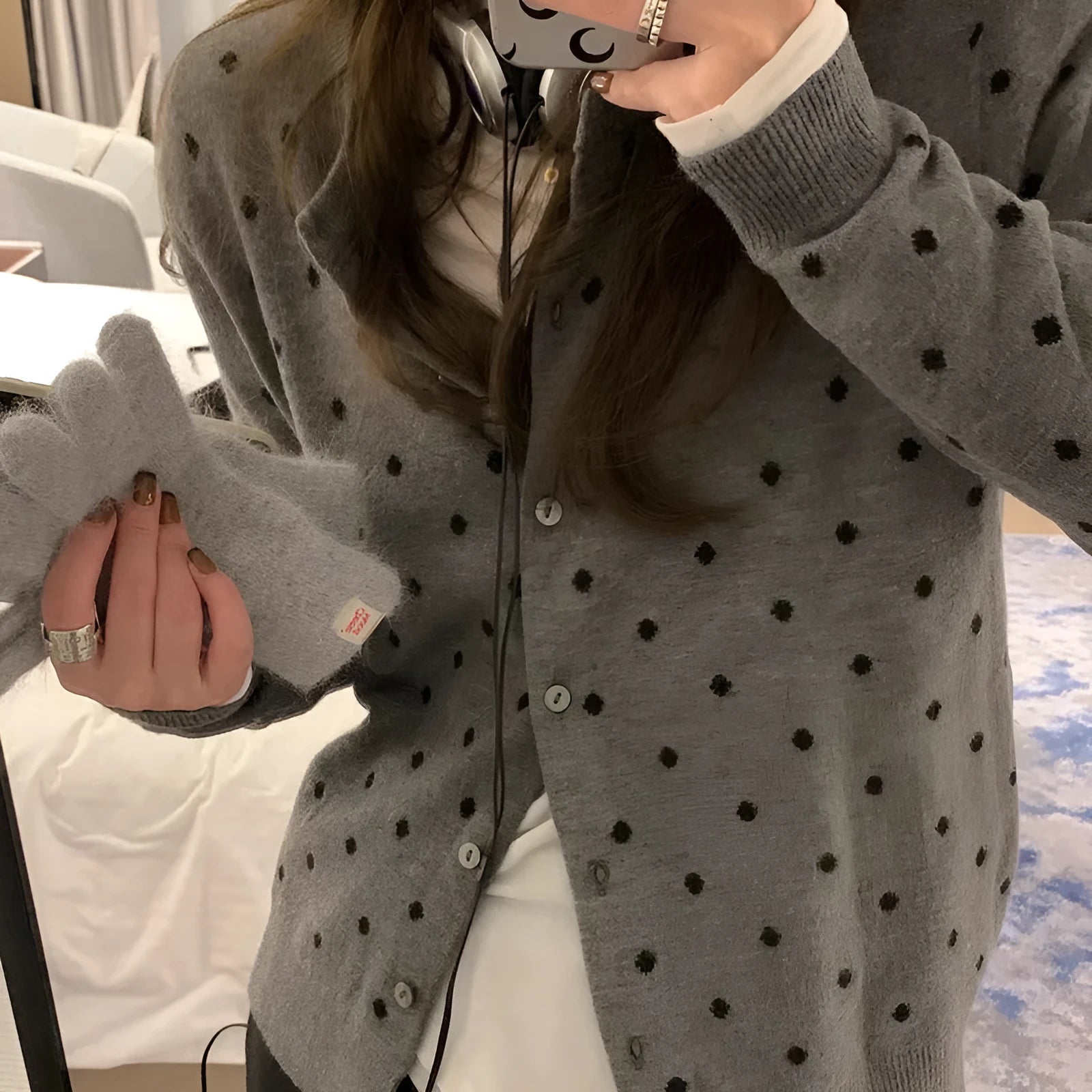 Gray dot knitted cardigan with crochet flower detail on woman, Korean style loose fit