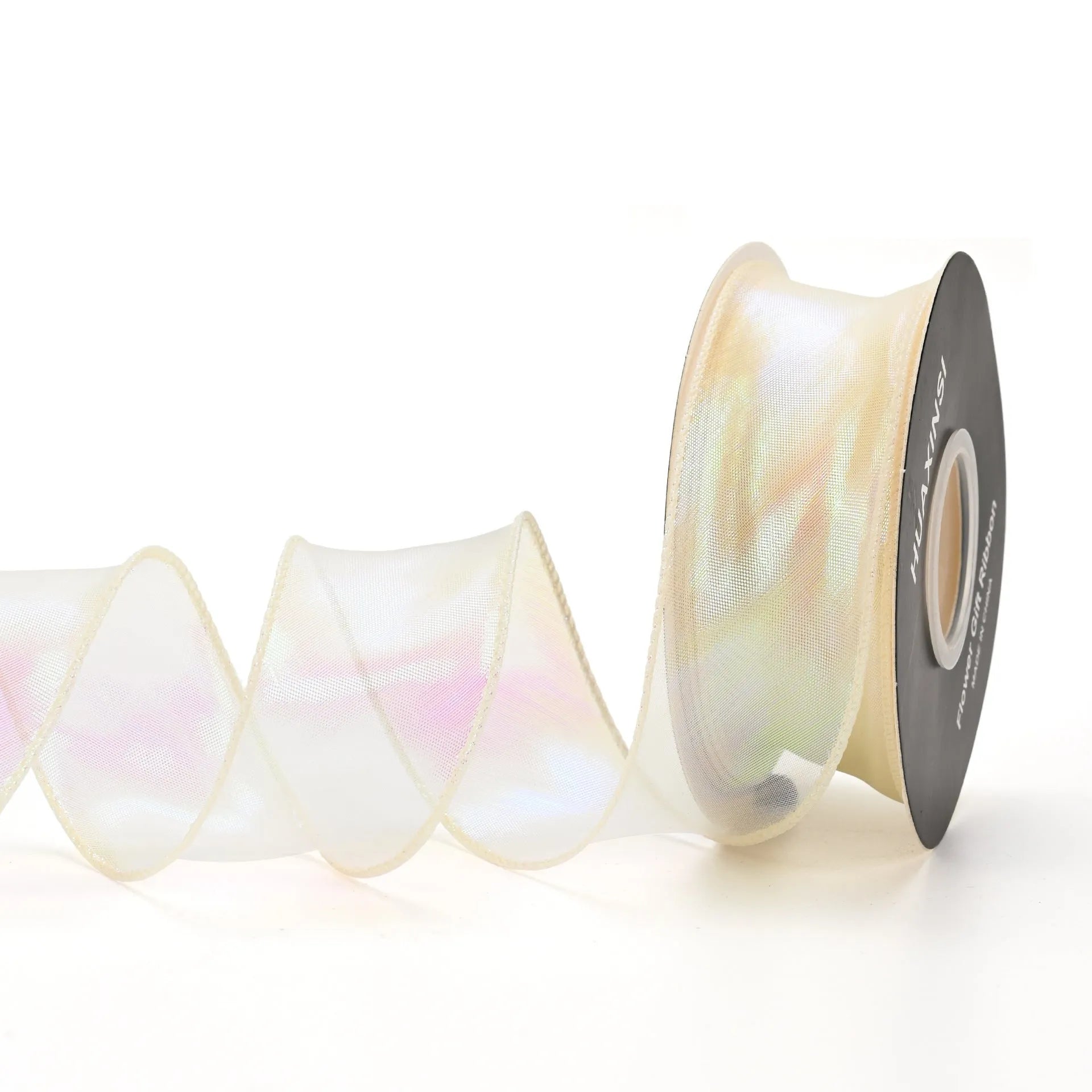 Roll of 4cm wide mesh fishtail yarn floral wave ribbon in multiple illusion colours.