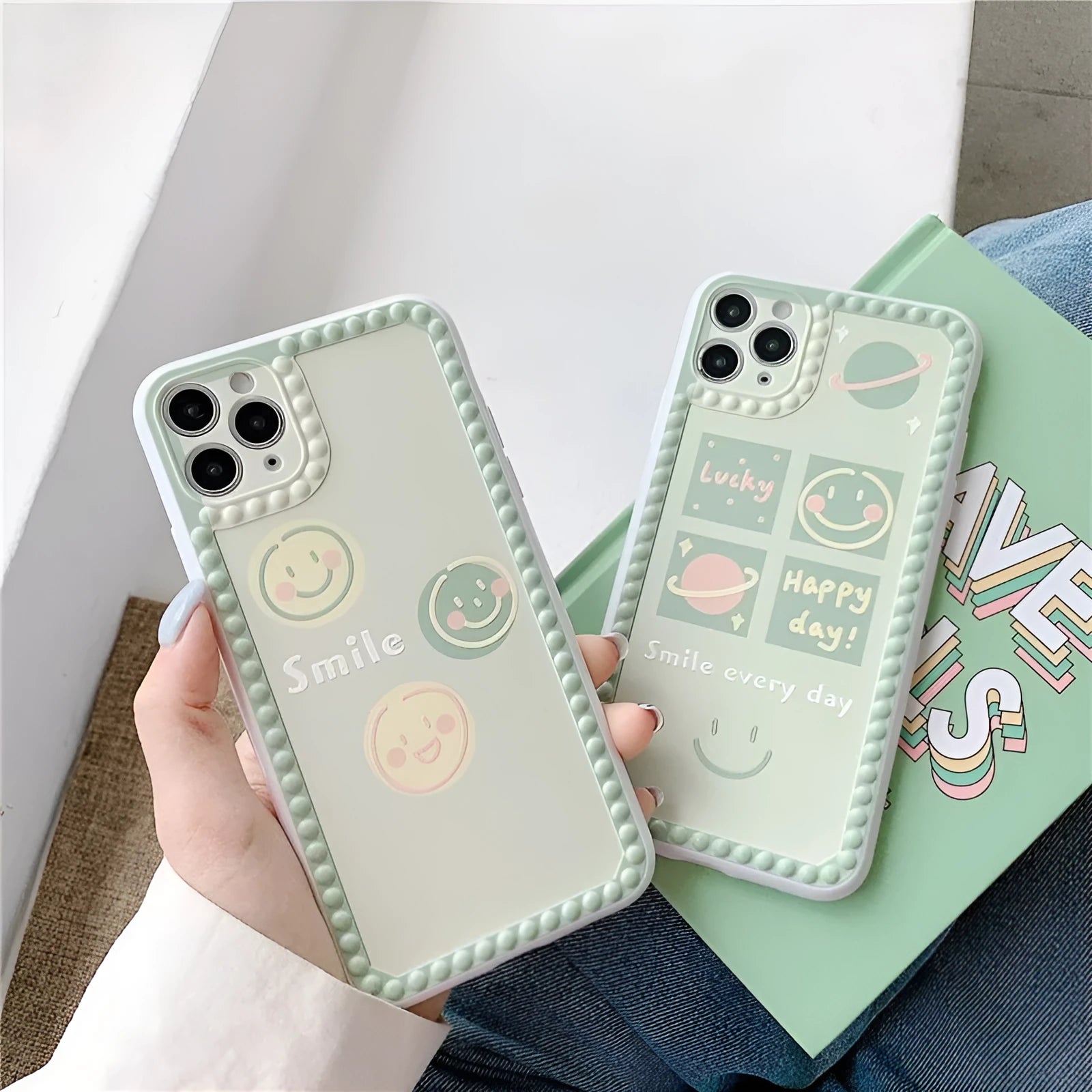 Green TPU iPhone case featuring a geometric smiley face and polka dot frame design.