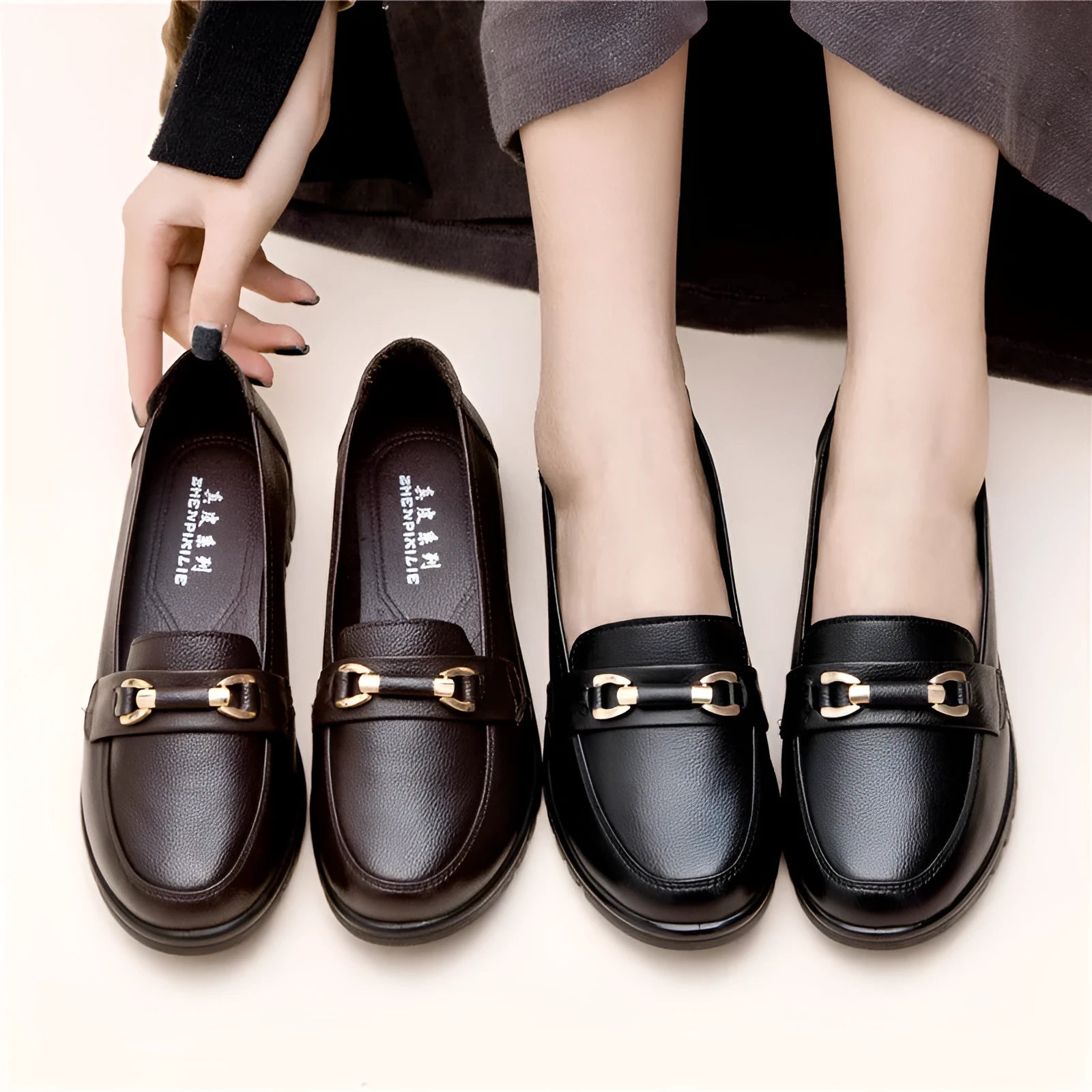 Black women's casual leather pumps with a round toe and soft rubber sole.