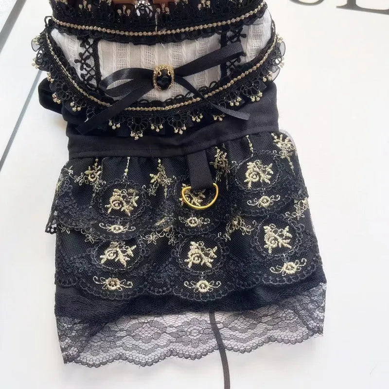 Golden Gothic princess skirt costume for a small dog on a mannequin.