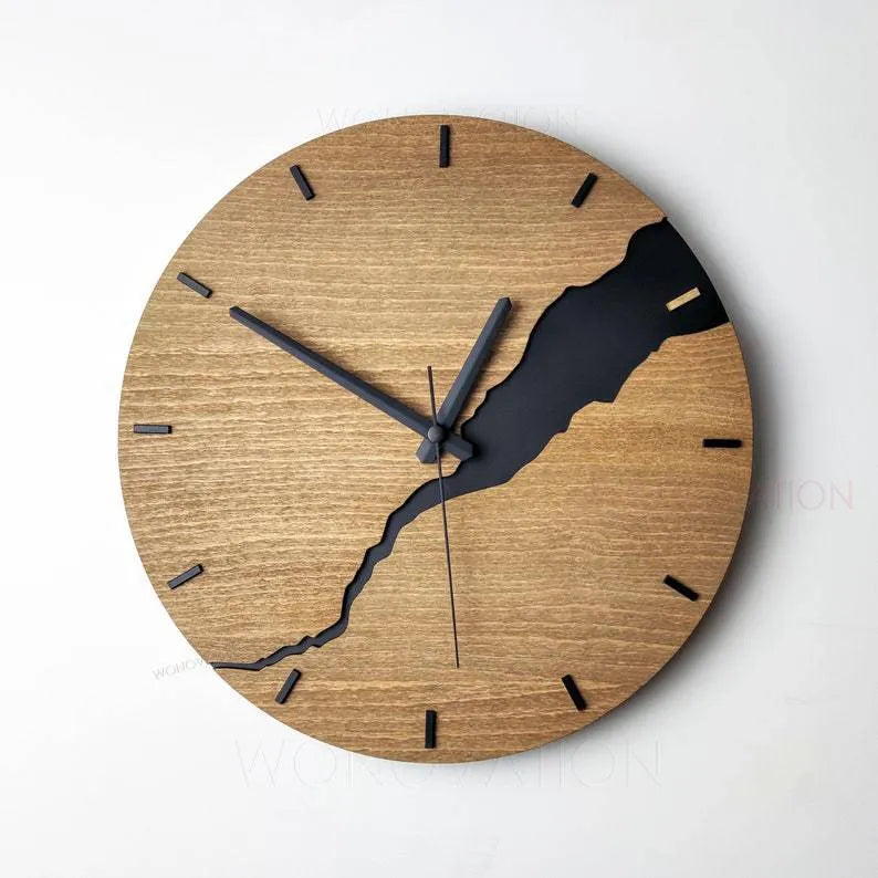 Modern wooden wall clock with cracked finish and Arabic numerals in contemporary home setting