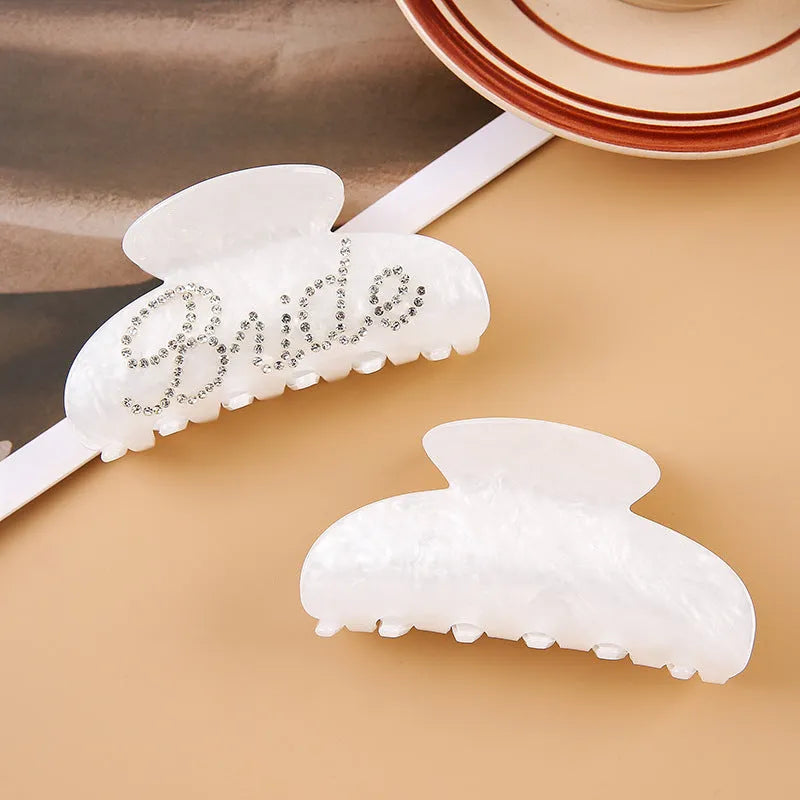 Pink and white 10cm acrylic shark hair clips with multi-diamond spot drill pattern and double-sided design