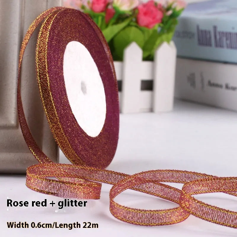 Roll of narrow 0.6cm wide polyester gift wrapping ribbon in assorted colours, showing 22 metre length.