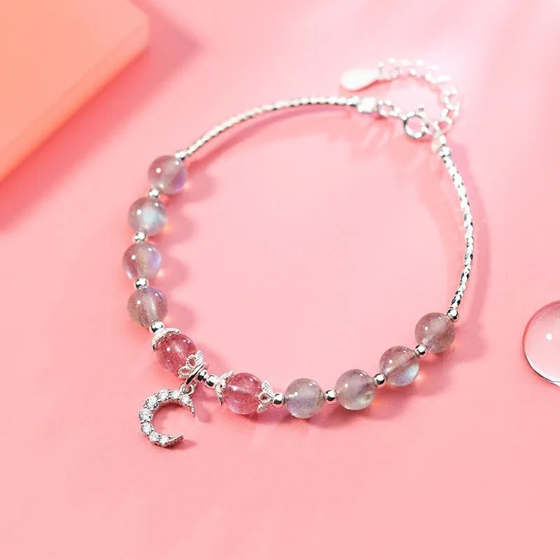 Natural moonstone adjustable bracelet with crescent moon charm showing 6mm bead and silver extension chain