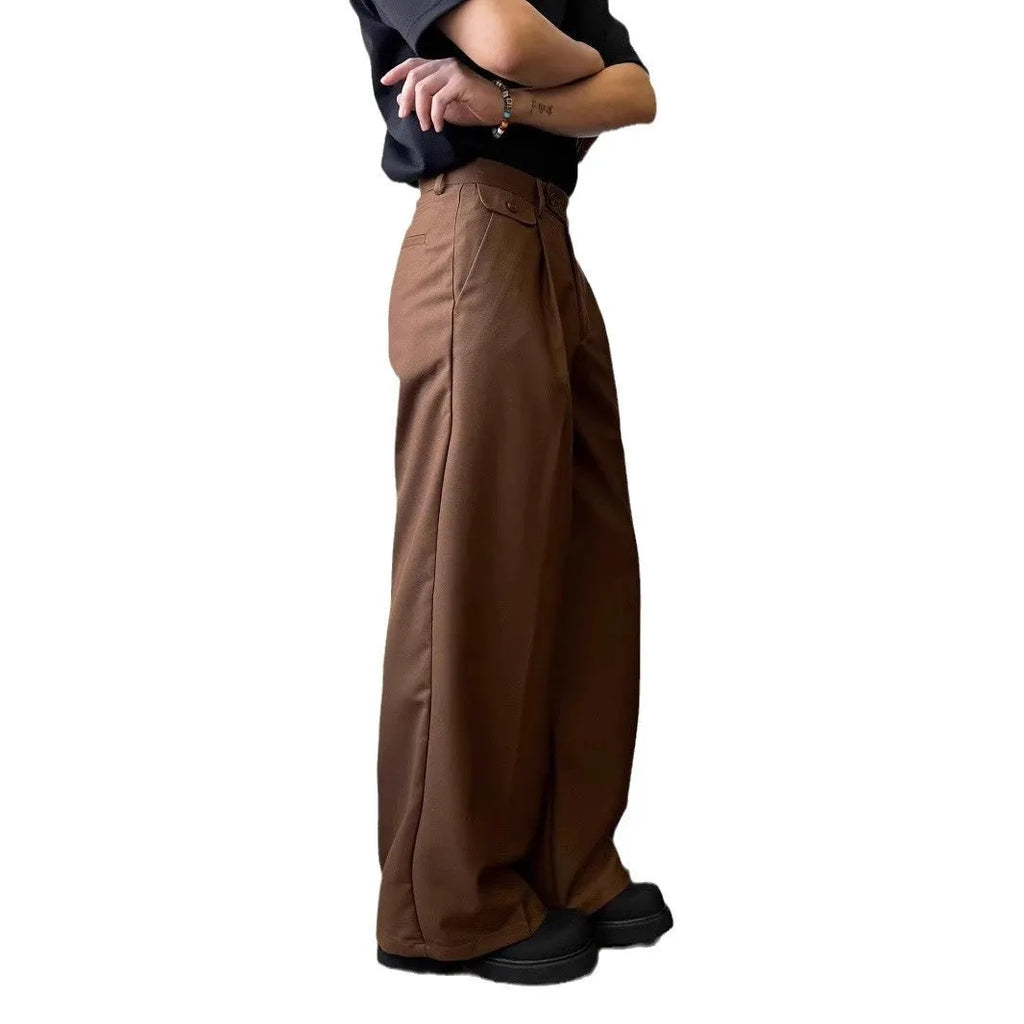 Men's straight-leg wide casual suit pants in brown solid colour, showing loose drape fit.