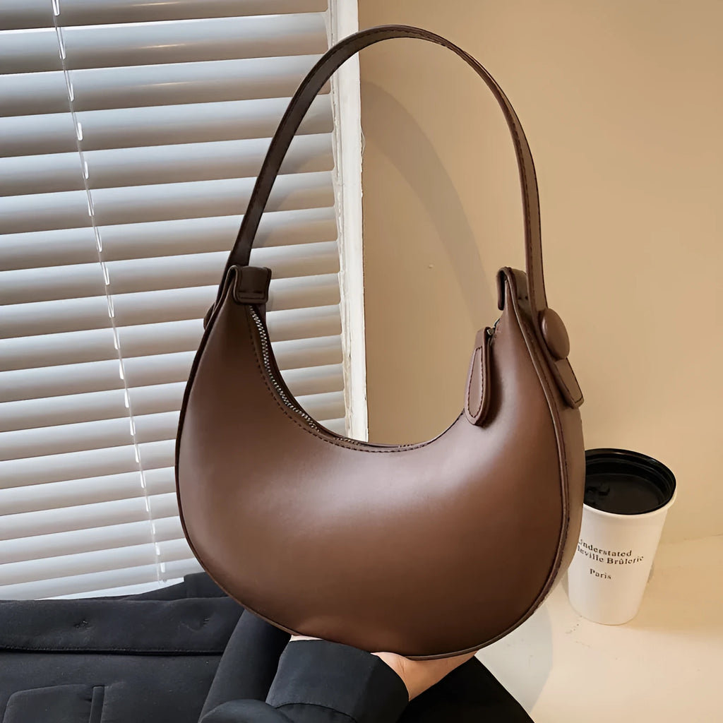 Women's retro shoulder bag in dumpling shape with sandwich pocket and zippered compartment