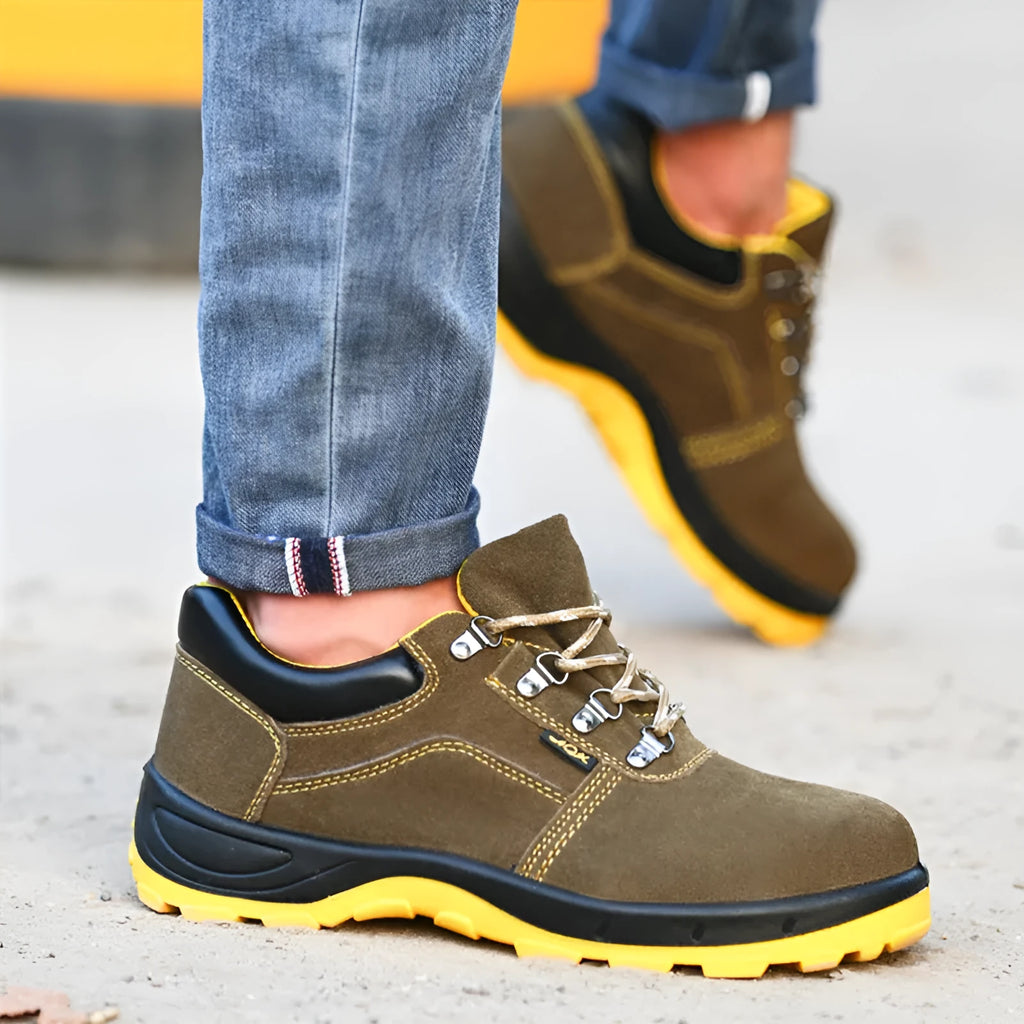 Bronze cowhide leather low-cut safety boots with a steel toe cap and solid rubber tread sole.