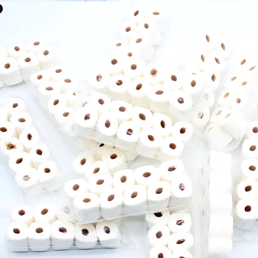 Small paper model of a tissue roll for dollhouse play, measuring 30mm by 15mm by 80mm.