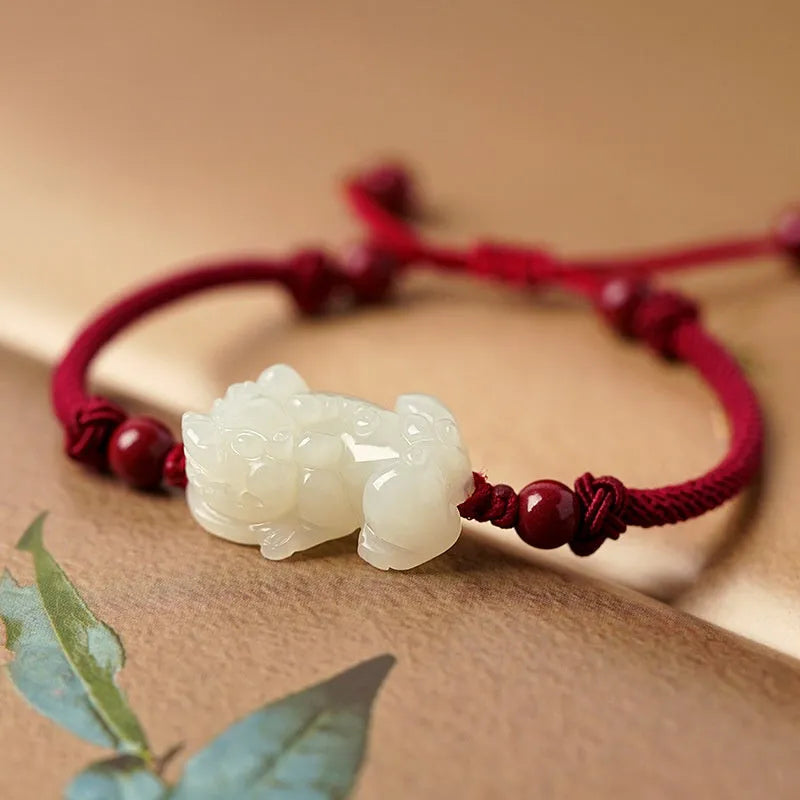 Women's Hetian jade bracelet with black and red braided ropes in Chinese style