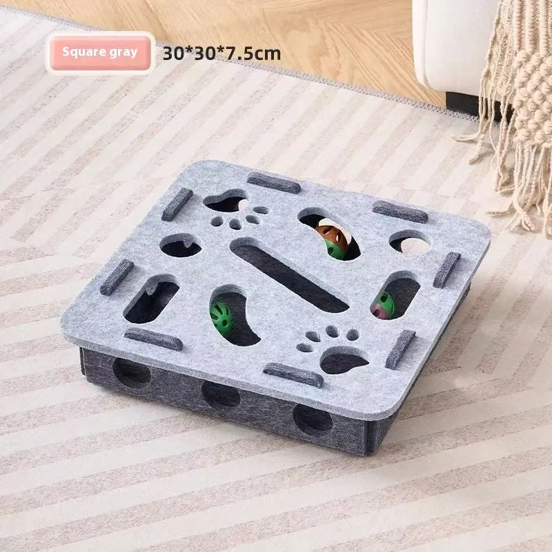 Square felt cat toy with artifact holes in green brown colour measuring 30cm