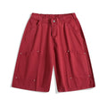 Women's loose-fit cropped pants in micro-elastic fabric showing apricot colour with wide-leg design