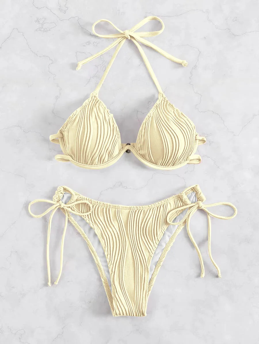 Women's apricot coloured bikini swimsuit with steel underwire bracket on a mannequin.