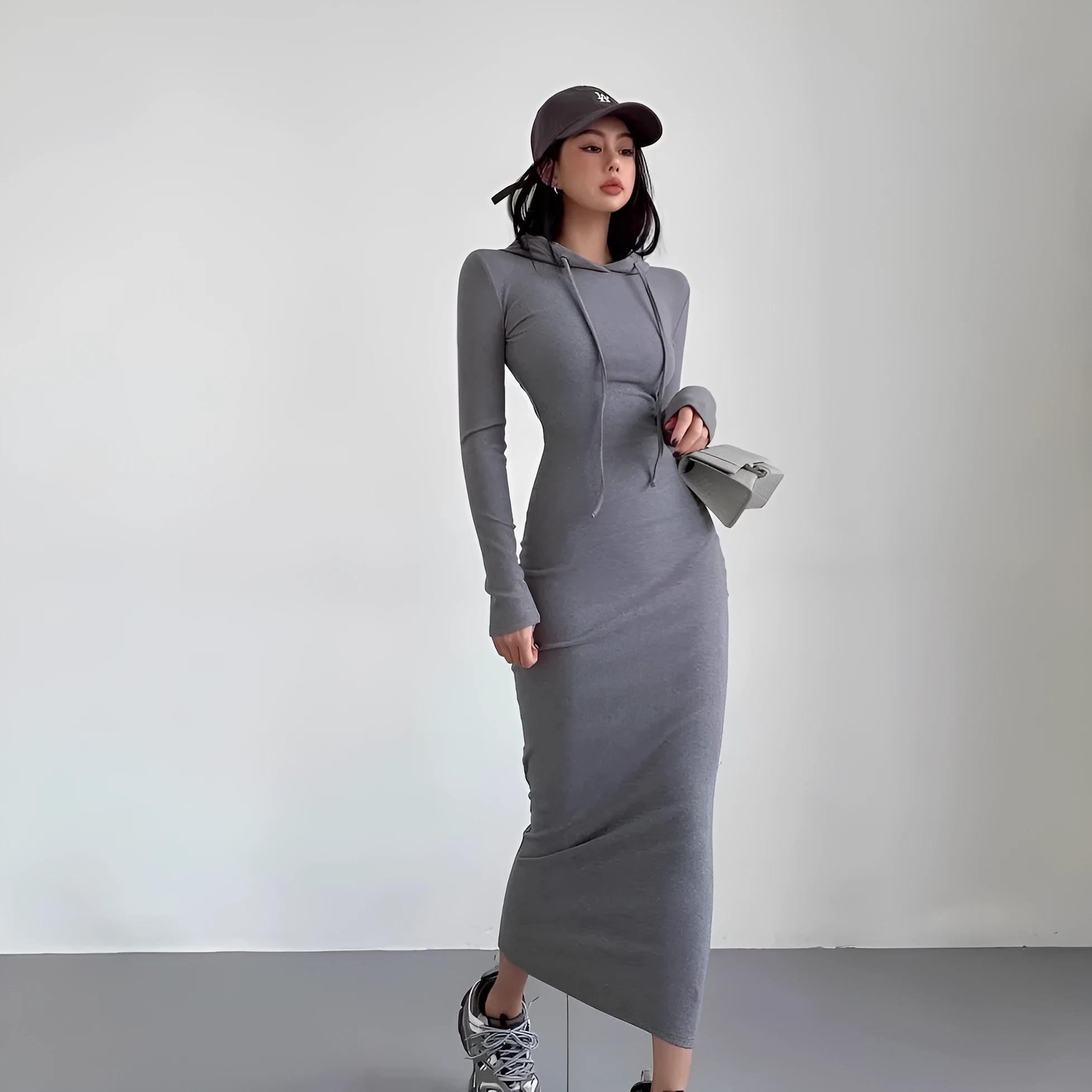 Women's grey polyester sheath dress with long sleeves and a high waist, knee-length.