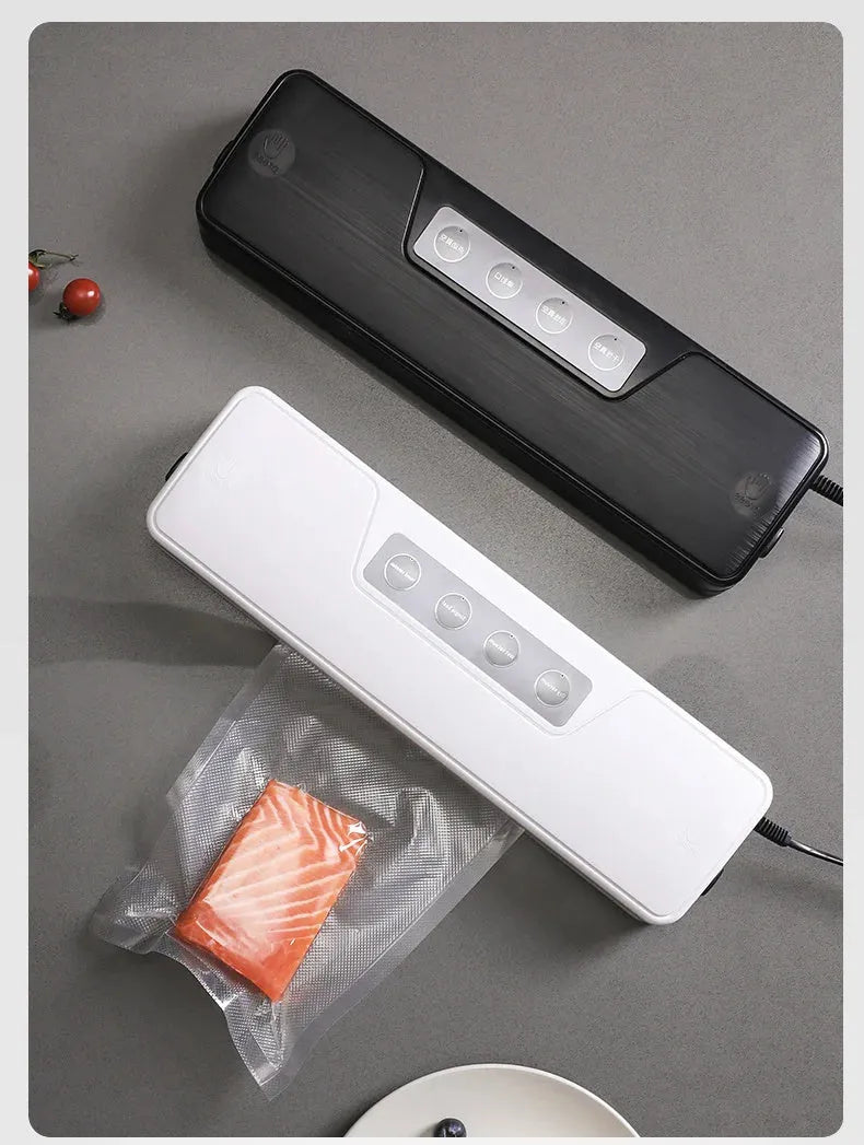 White automatic vacuum sealer machine with compact compression sealing design for household food preservation