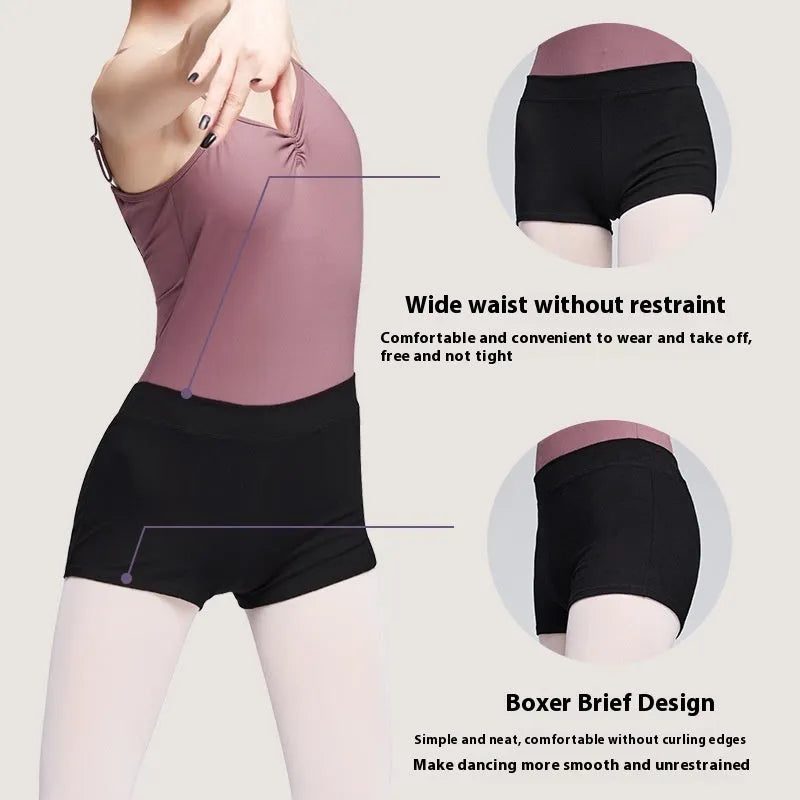 Black cotton ballet dance shorts for women, laid flat showing solid colour and stretch fit.