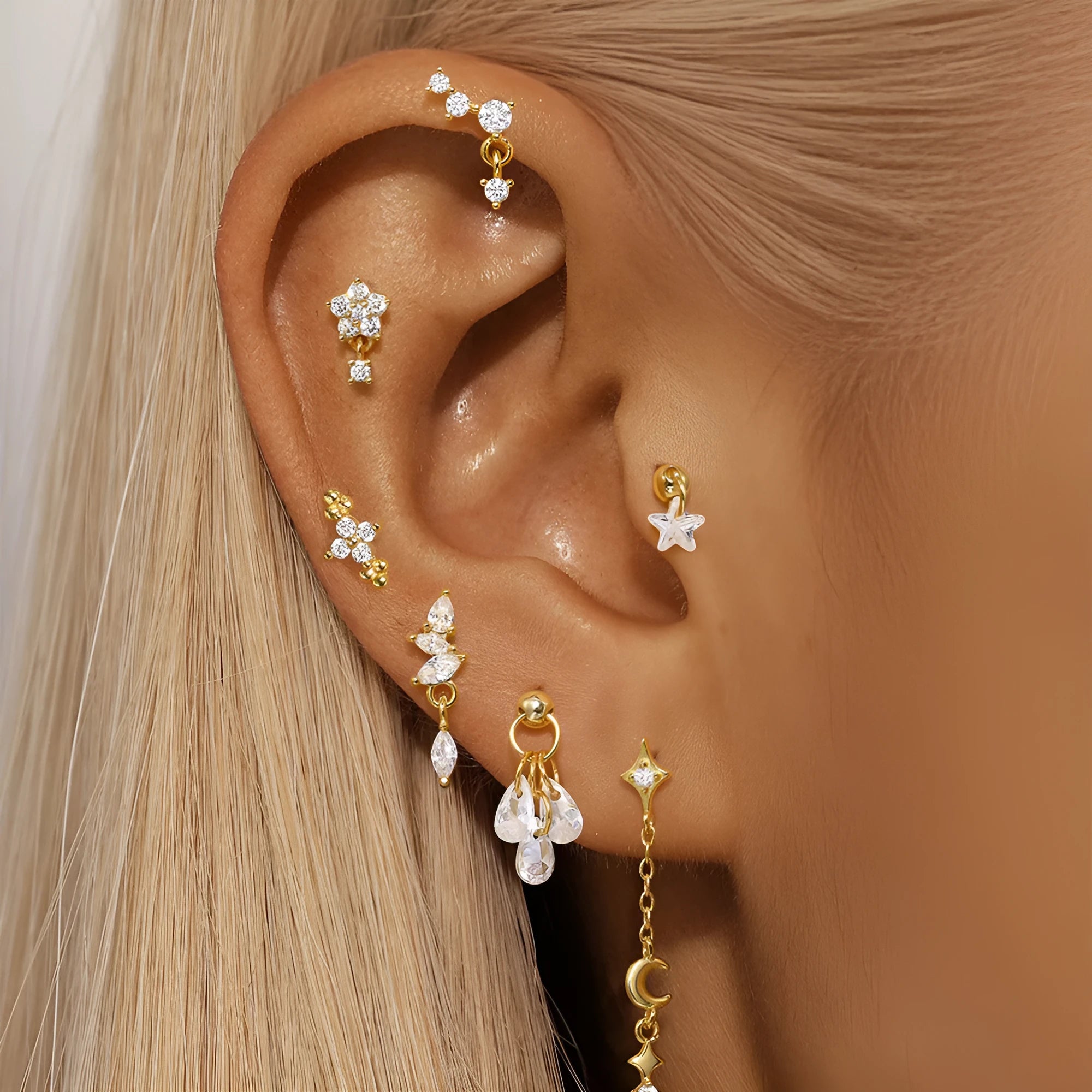 S925 sterling silver geometric moon and star earrings with embedded diamond detailing in gold tone finish
