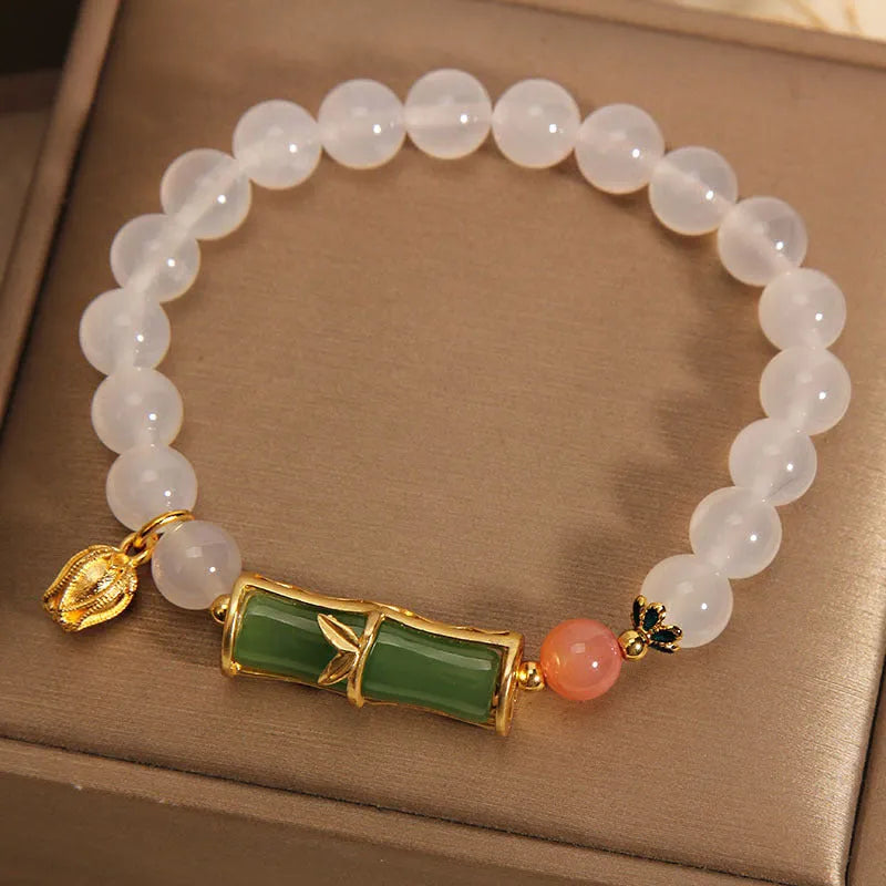 Women's jade bracelet with white agate stones in bamboo bead design