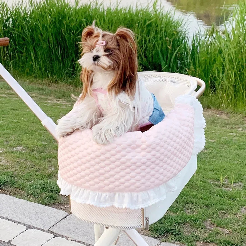 Pet stroller three-piece cushion set with removable cloth towel, pillow and pad in floral pattern.