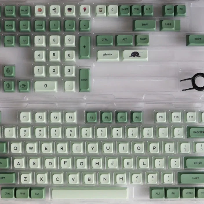 Matcha green PBT keycap set with 124 keys for mechanical keyboards, showing sublimation dye legends.