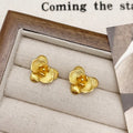 Retro flower fashion earrings for women in gold or silver colour with detailed petal design