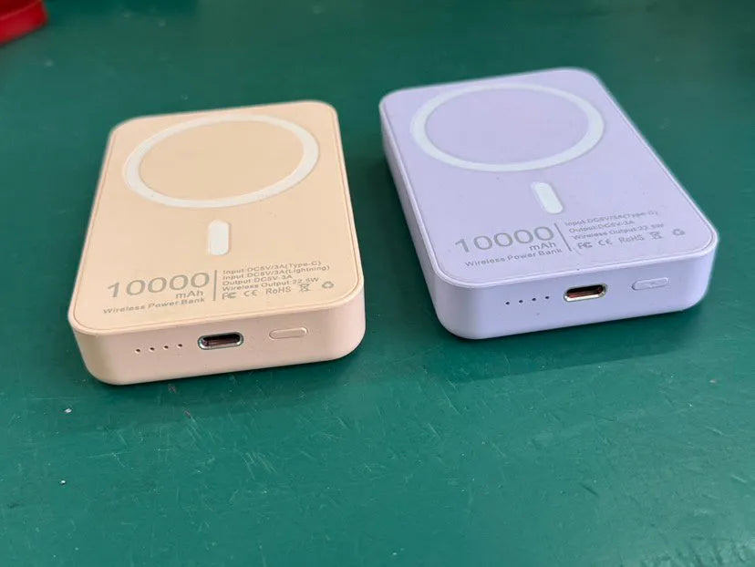 Magnetic wireless charger power bank in white with 5000mAh capacity measuring 100x65x16mm