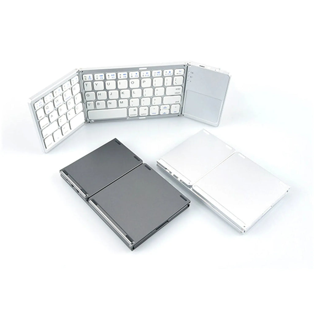 A closed black tri-fold Bluetooth keyboard next to a smartphone, showing its slim 0.8cm profile.