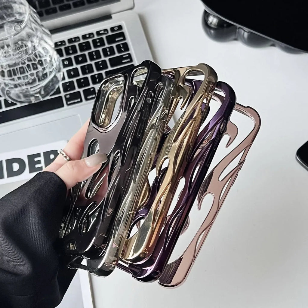 Electroplated hollow flame pattern TPU iPhone case in silver plating shown on a phone.