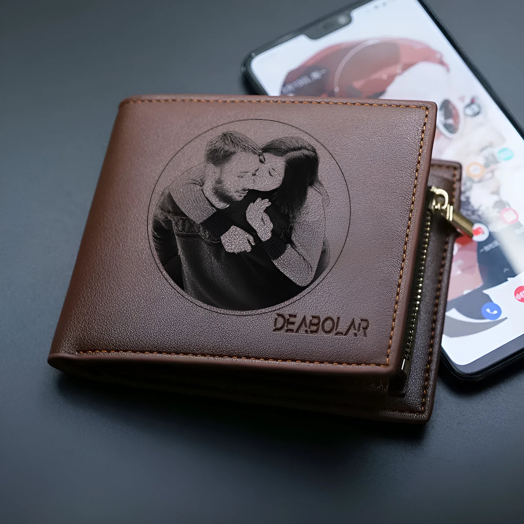 Men's brown leather wallet with a zipper closure, shown individually packaged.