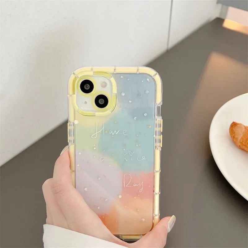 Minimalist yellow-edged silicone phone case for iPhone on a table, showing precise cut-outs for camera and ports.