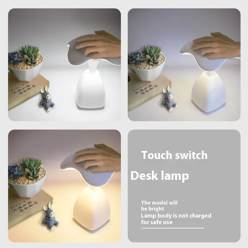 White modern LED desk lamp with plastic shade and touch controls for bedside or desk use