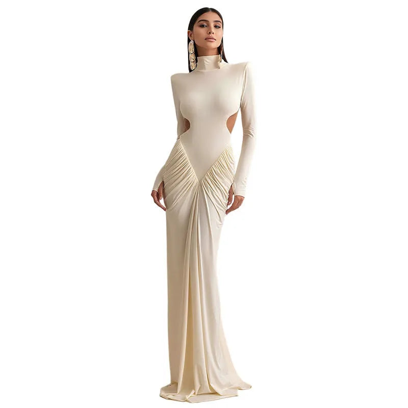 Long sleeve high collar backless dress in slim fit with pleated detailing.