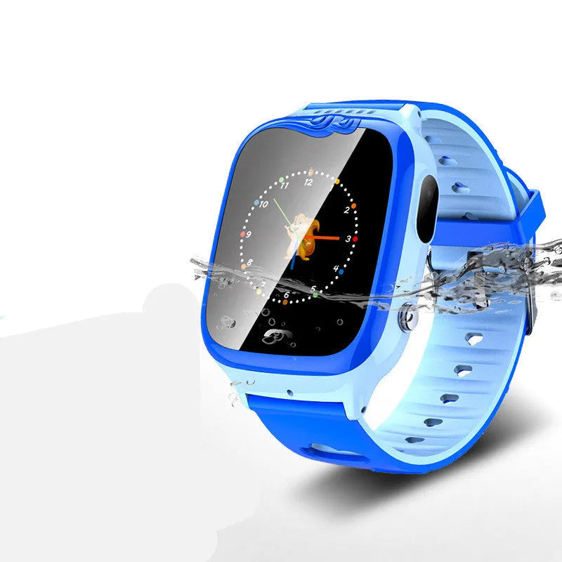 Children's smartwatch with touch screen showing positioning display on blue silicone wristband