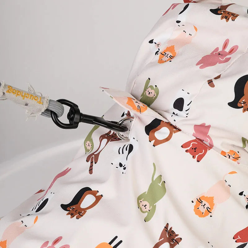 Beige cartoon dog raincoat with animal design and waterproof coating for wet weather protection