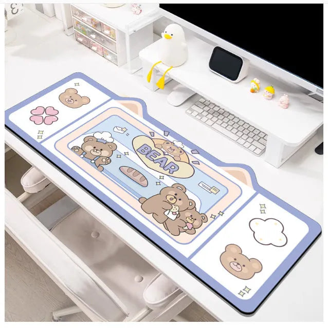 Oversized natural rubber mouse pad desk mat in pink bunny design on desk surface