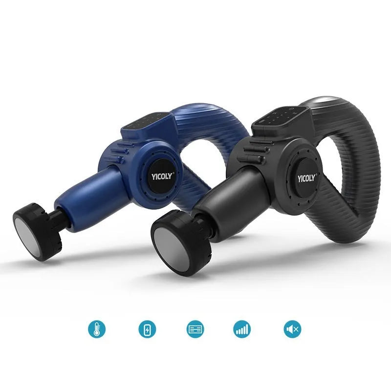 Black smart muscle massage gun with multiple attachment heads on a table