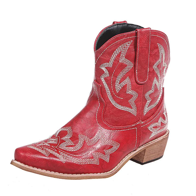 Women's blue embroidered cowboy boots with a wedge heel and pointed toe