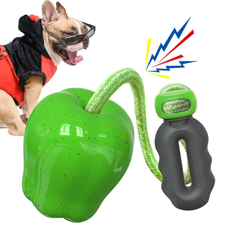 Green plastic apple-shaped dog toy with food-dropping ball function