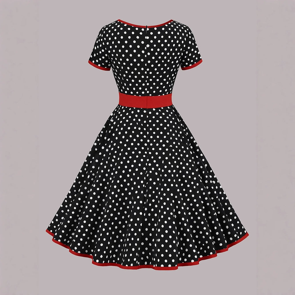 Multicolour polka dot pleated dress with square collar, short sleeves, and a zipper.