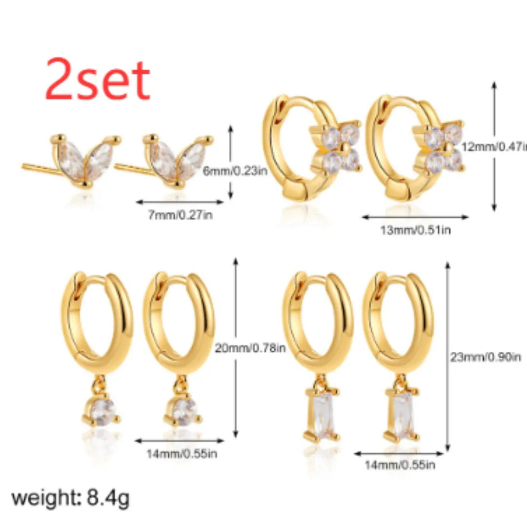 Geometric square earrings set with star shapes in gold or silver metallic finish