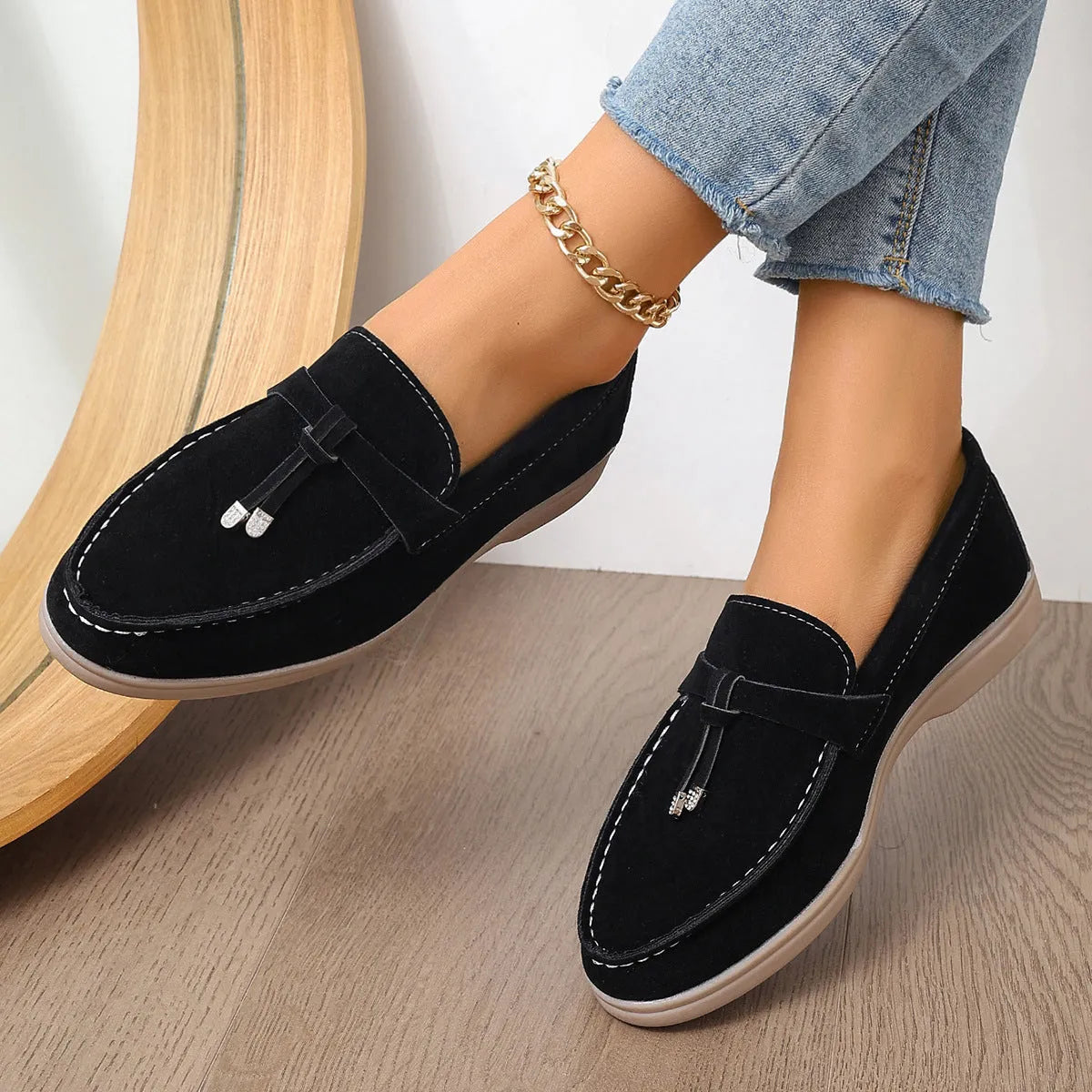 Casual canvas slip-on loafers with a round toe and platform heel, shown in a choice of colours.