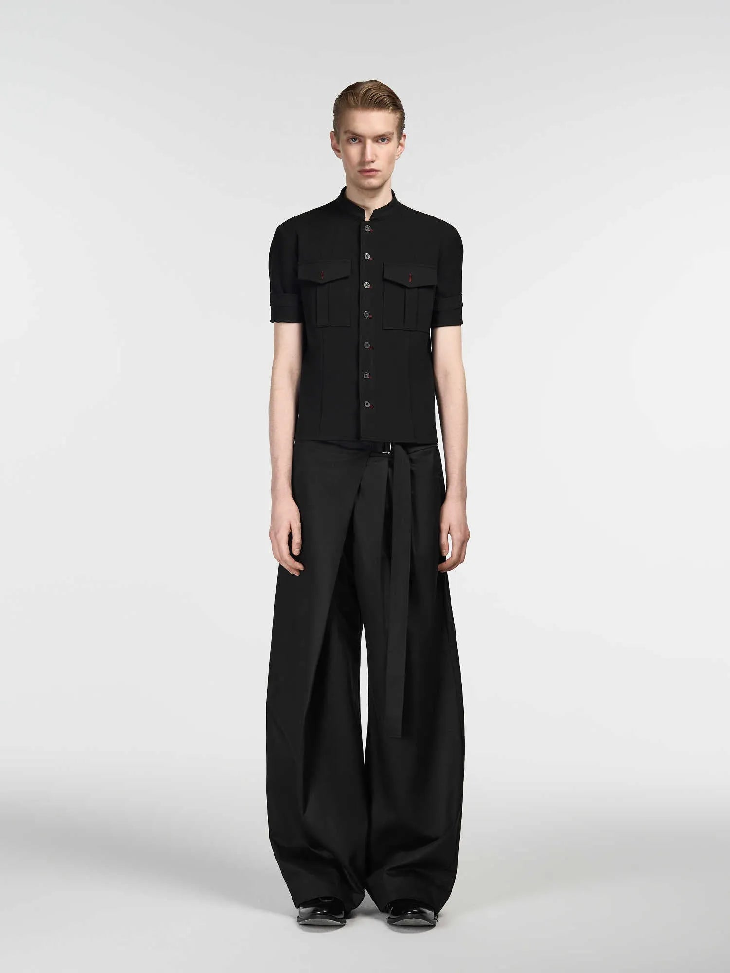 Black straight-leg trousers with adjustable waistband and single pleat front detail