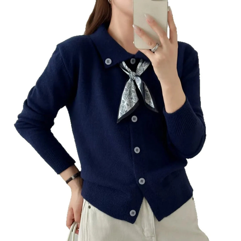 Beige lapel scarf collar acrylic cardigan with long sleeves on a hanger