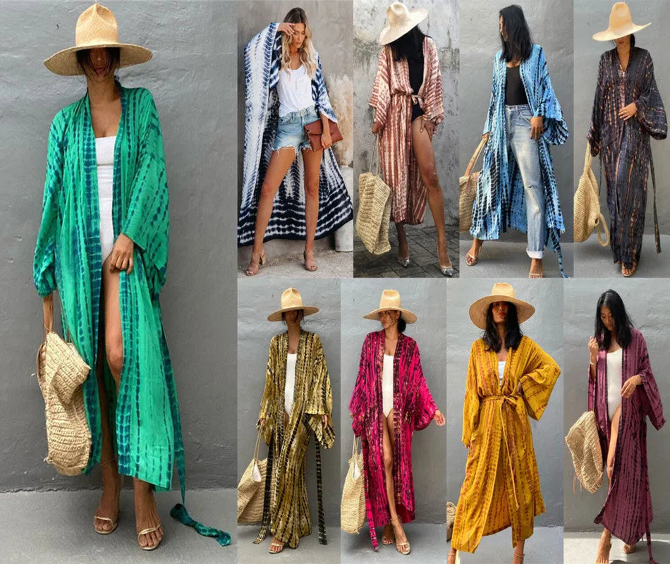 Loose cotton beach cover-up shirt in a printed design on a mannequin