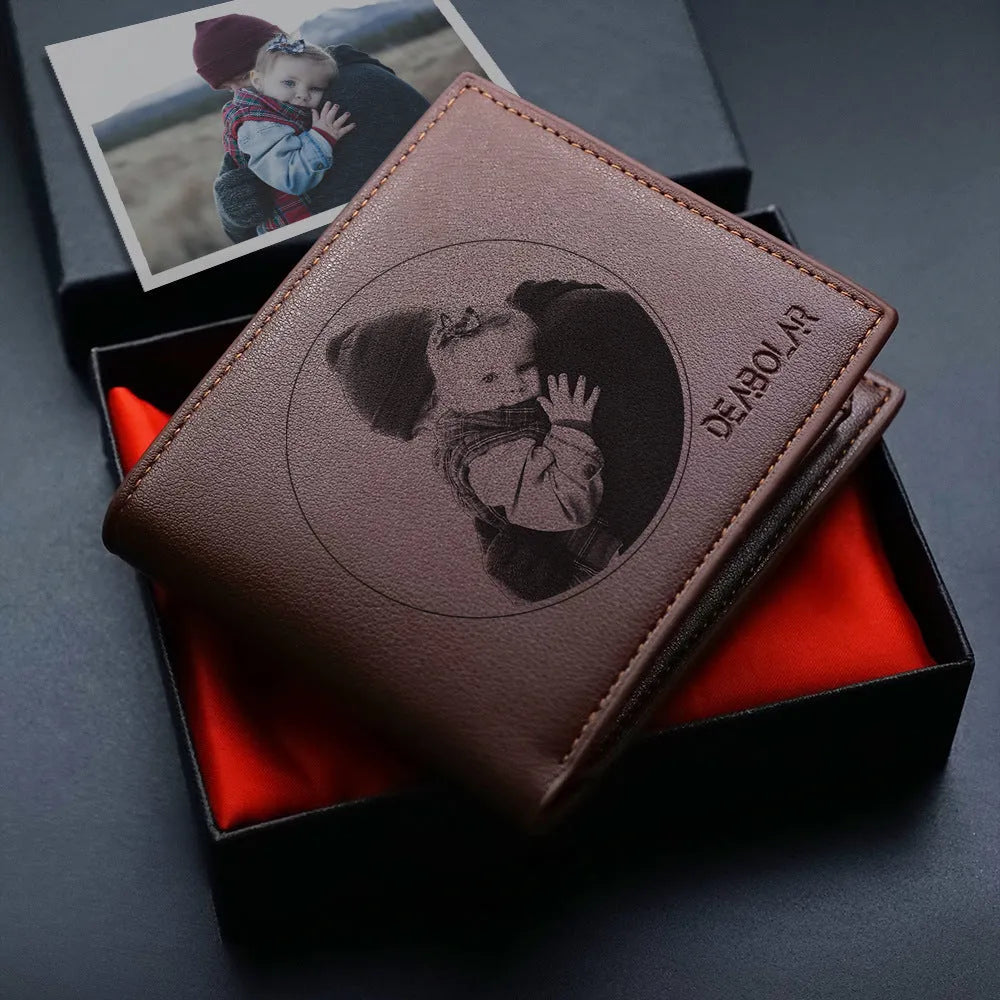 Men's brown leather wallet with a zipper closure, shown individually packaged.