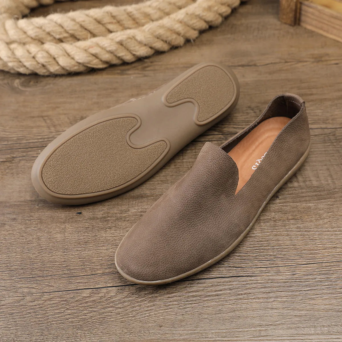 Handmade low-top men's shoes in khaki with a wedge flat heel and rubber sole.