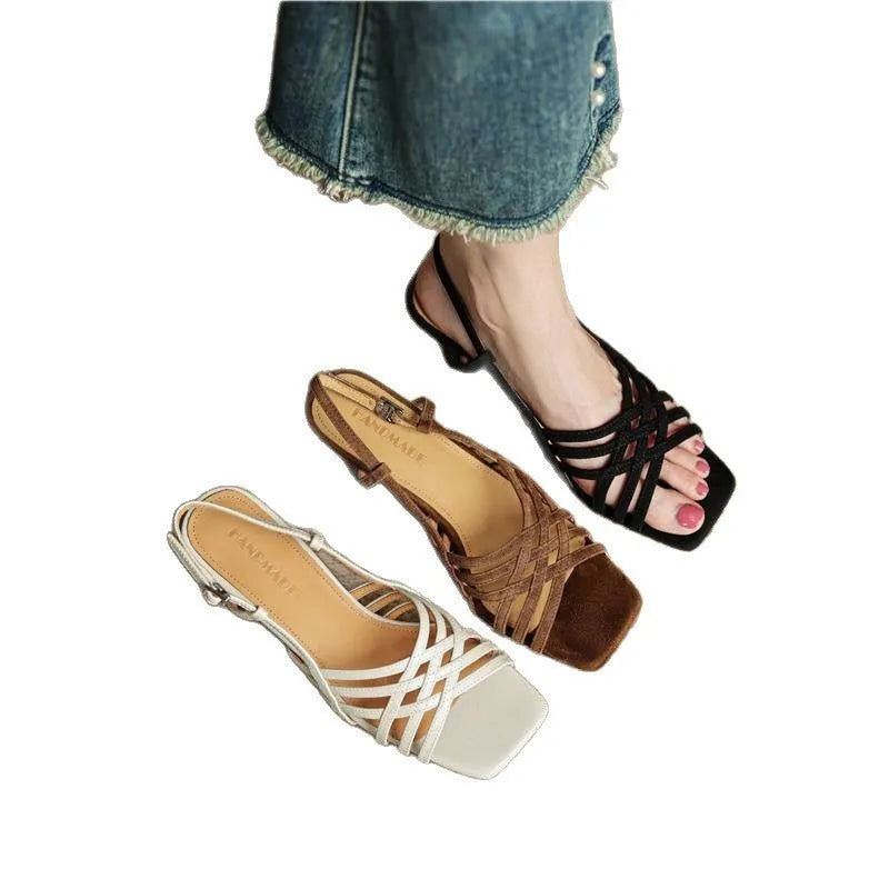 Light brown retro women's sandals with thin cross straps, ankle buckle, square toe, and a mid heel.