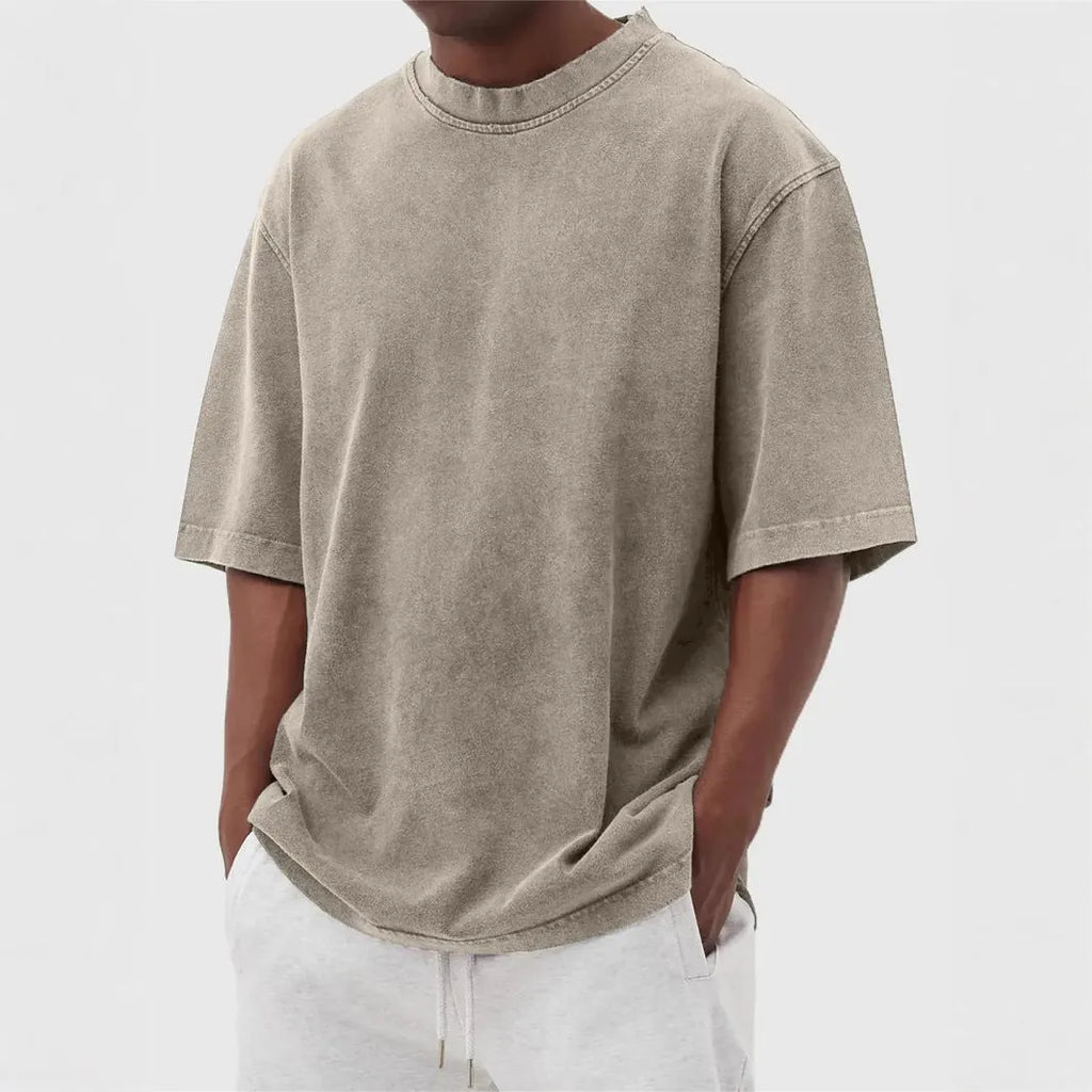 Men's distressed stone wash pullover T-shirt in loose fit with half sleeves available in multiple solid colours